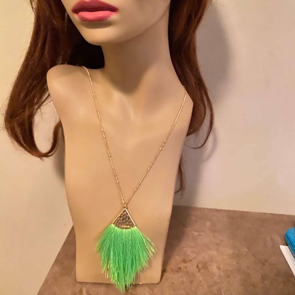 Neon green feathery look necklace.